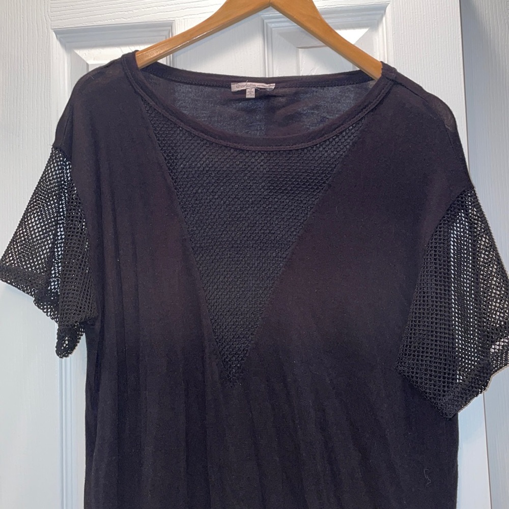 Black shirt with netted sleeves and V design